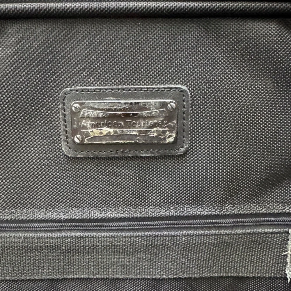 American Tourister Black Ballistic Nylon Rolling Carry On Suitcase Luggage